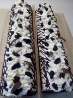 Медовий рулет з чорносливом та горіхами